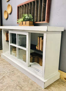 Classy sliding door console cabinet