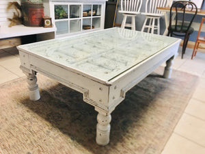 Gorgeous carved wood glass top coffee table