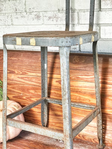 Cool old metal mechanic stool