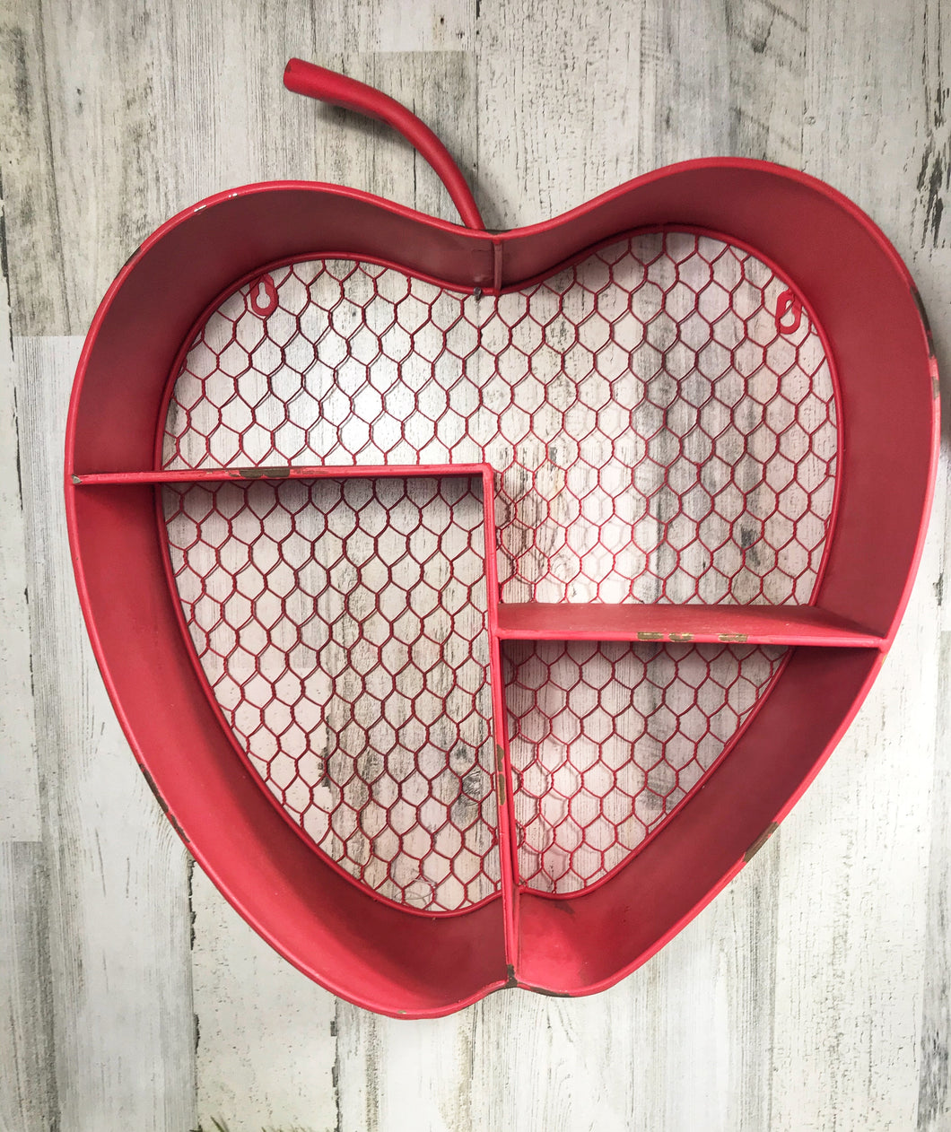 Giant metal apple shelf